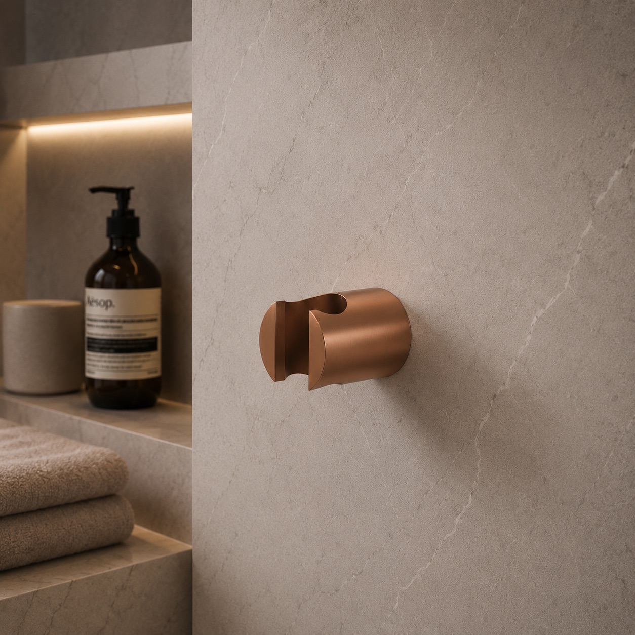 Support mural pour douchette or rose acier inox 316L